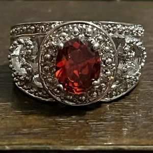 Fashion Ring In Size 7.5 With Burnt Orange Color Stone.